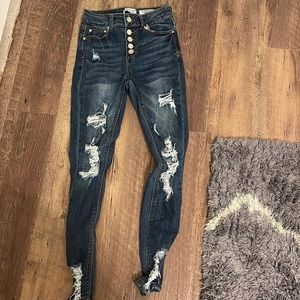These are blue denim jeans. The brand is Indigo Rein. They are size small